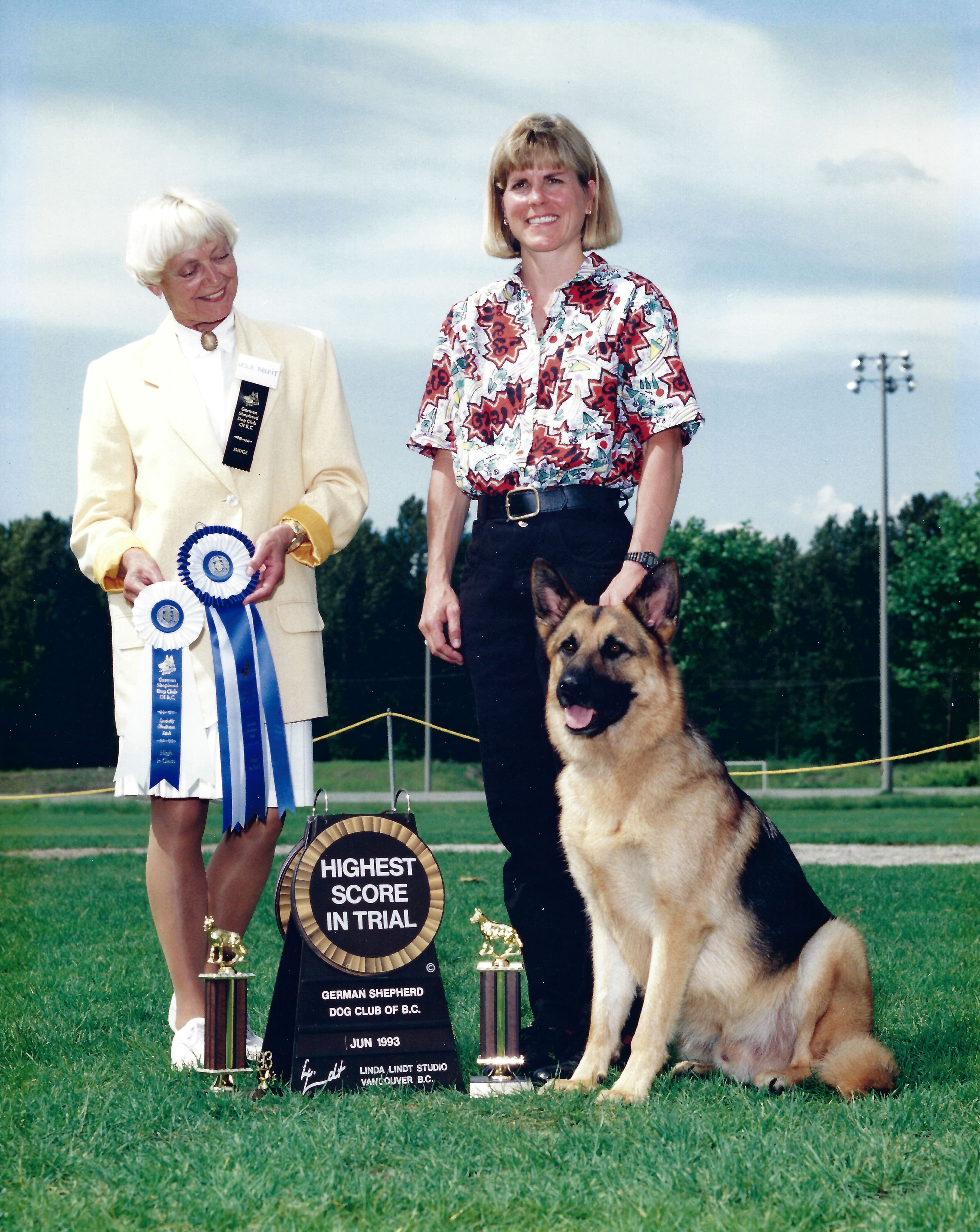 Julie with her dog Nietzsche after winning High in Trial
